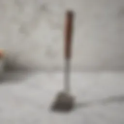 A sleek nonstick spatula resting on a marble countertop