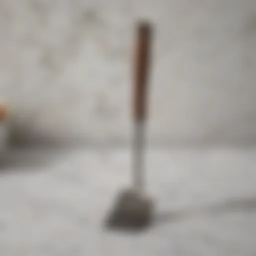 A sleek nonstick spatula resting on a marble countertop