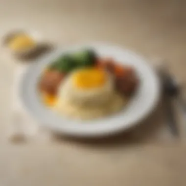 A beautifully plated meal featuring cheesy mashed potatoes alongside meat and vegetables