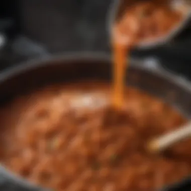 Simmering the Perfect Bolognese Sauce A close-up of a bubbling pot of bolognese sauce simmering on the stove