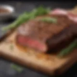 Juicy beef steak resting on a cutting board with herbs