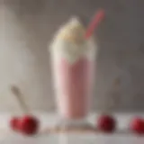 Close-up of a delicious milkshake topped with whipped cream and a cherry