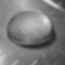 Shiny stainless steel surface with visible fingerprints