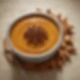 Lush canned pumpkin pie filling in a bowl with spices