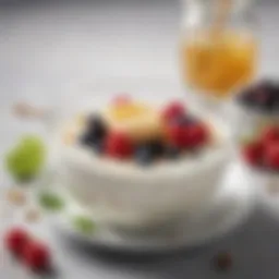 A creamy bowl of Greek yogurt topped with fresh berries and honey
