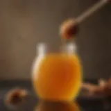 Golden honey drizzling elegantly from a jar