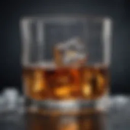 A glass of whiskey on the rocks with glistening ice cubes