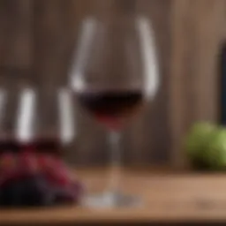 A glass of low carb dry red wine elegantly placed on a wooden table.