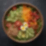 A colorful salad bowl featuring a variety of fresh vegetables and grains.