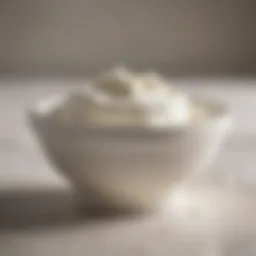 A bowl of sour cream showcasing its smooth texture and rich appearance