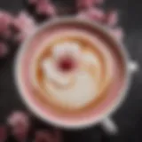 Delicate cherry blossom latte art atop a Starbucks Sakura beverage