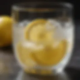 Refreshing glass of lemon water with a hint of cayenne pepper.