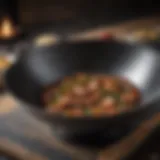 A close-up of a carbon steel wok showcasing its smooth surface and unique texture.