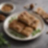 A beautifully arranged plate of walnut squares adorned with fresh herbs