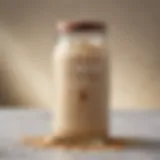 A close-up view of Fontana White Mocha Sauce in a glass jar