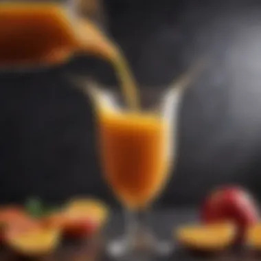 A close-up of juice being poured into a glass with fruits surrounding