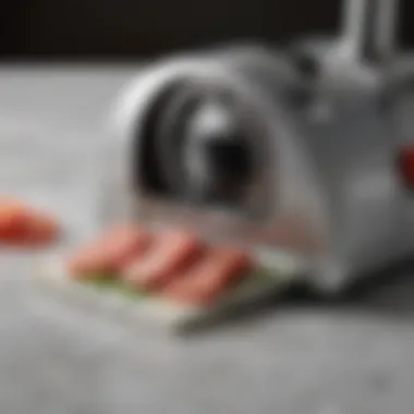 Sleek Design and Precision of the Geoffrey Zakarian Slicer A close-up view of the Geoffrey Zakarian Slicer showcasing its sleek design and sharp blade.