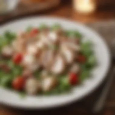 Elegant Presentation of Chicken Salad An elegant presentation of chicken salad on a plate garnished with herbs