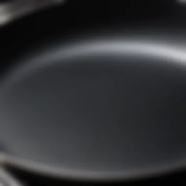 Close-up of a gleaming carbon steel pan showcasing its smooth surface and rich color.