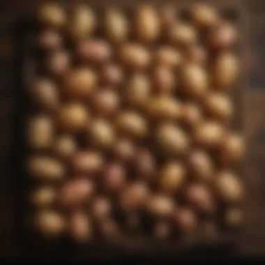 Aesthetic Arrangement of Different Potato Varieties A variety of potatoes arranged aesthetically on a wooden table