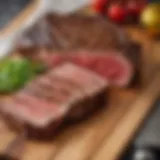 A beautifully marbled Kansas City Strip steak on a cutting board