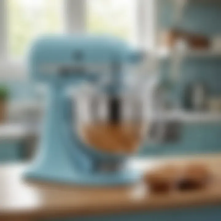 Close-up of the light blue Kitchen Aid mixer showcasing its features