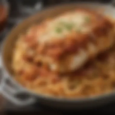 Baked chicken parm served with a side of spaghetti