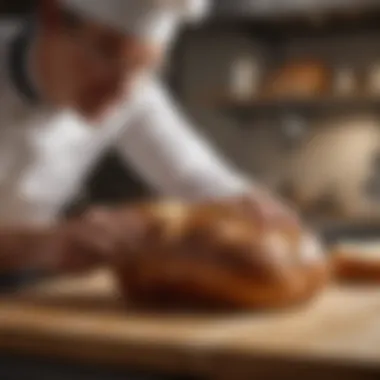 A baker slicing into a freshly baked loaf revealing its airy interior