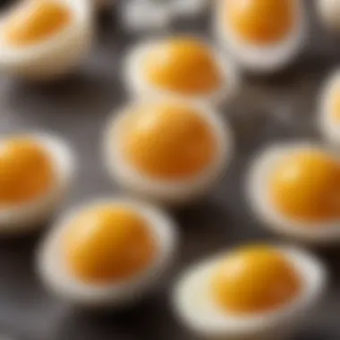 Eggs being peeled to reveal their perfect yolks