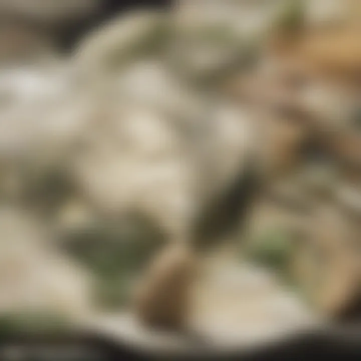 A close-up of ranch dip in a bowl, garnished with fresh herbs and surrounded by vegetables for dipping.