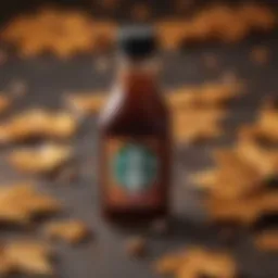 Close-up of a bottle of Starbucks Chestnut Praline Syrup with autumn leaves in the background