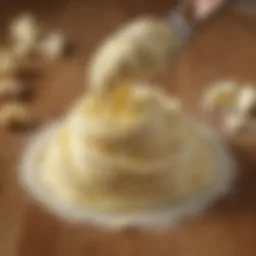 A close-up of high-quality butter and sugar being creamed together.