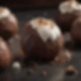 A close-up of a decadent chocolate truffle filled with marshmallow, showcasing glossy chocolate exterior and soft interior