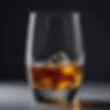 A close-up view of aged single malt whisky in a crystal glass highlighting its rich color.