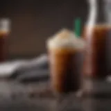 A close-up of a cold brew blended drink with a frothy top and coffee beans in the background